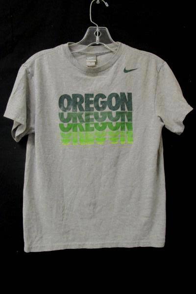 grey and green nike shirt