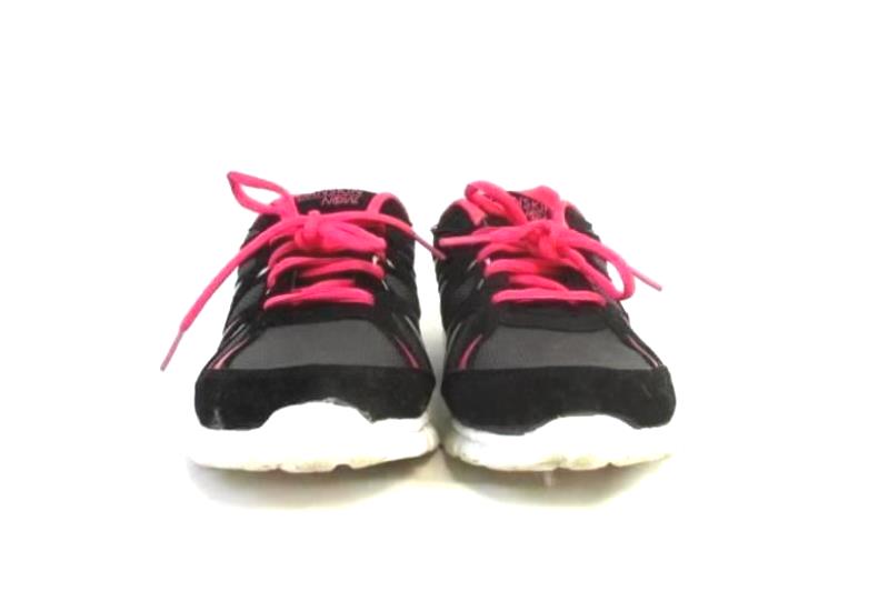 black shoes with pink laces