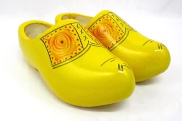 yellow wooden clogs